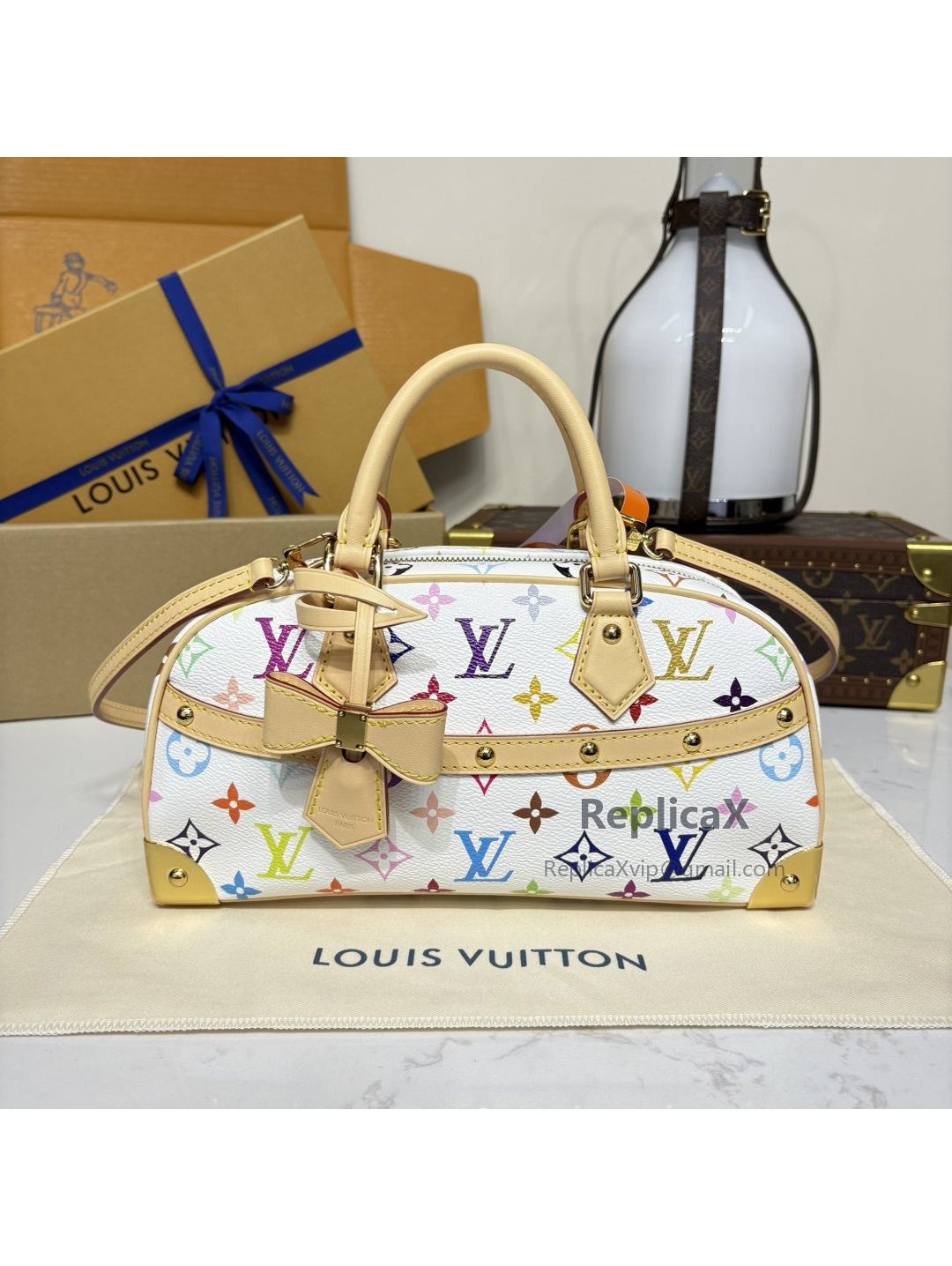 Louis Vuitton Speedy in white Monogram Multicolore M13084