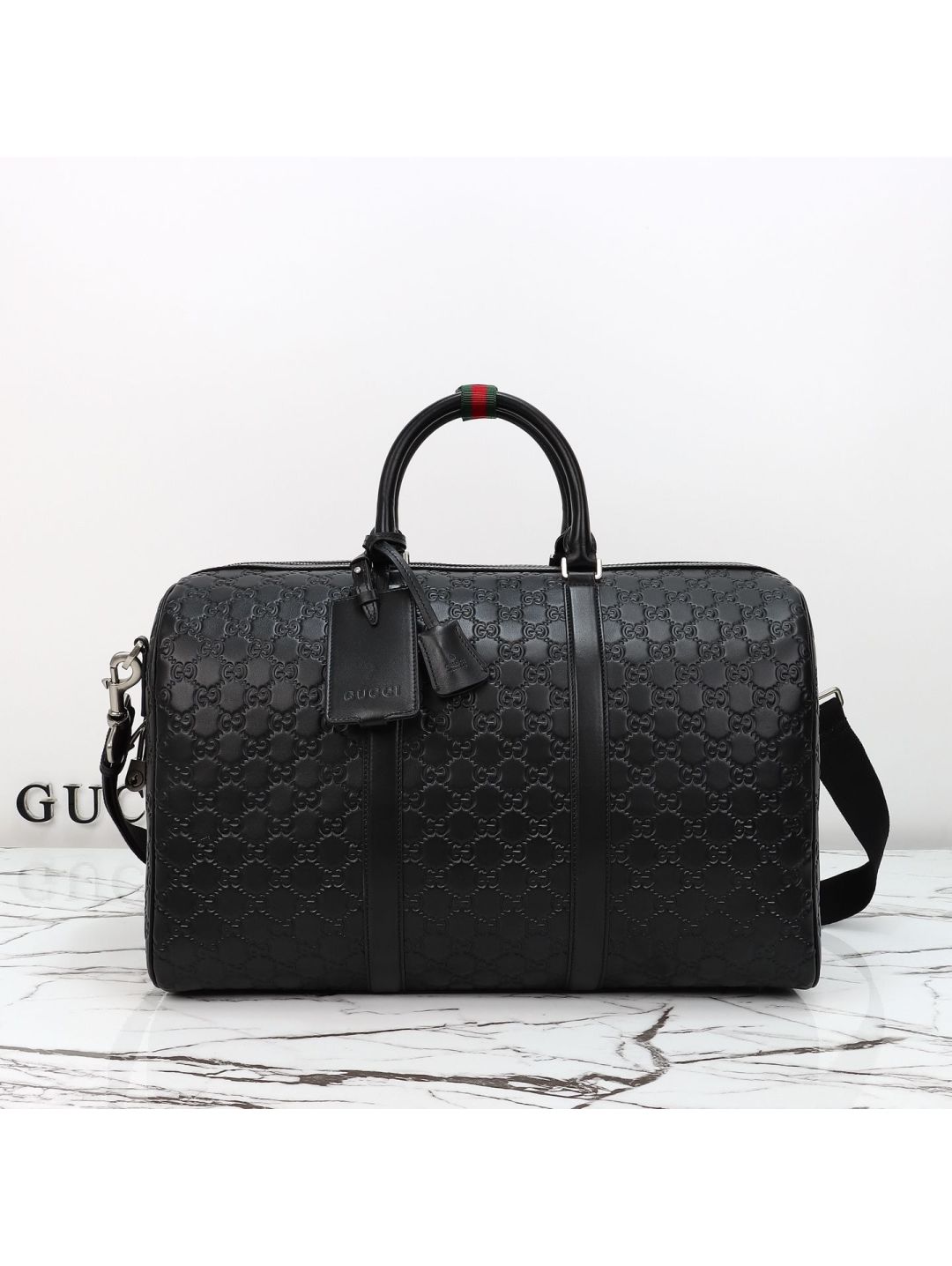 gg-embossed-boston-bag-in-black-rxgui292532-01