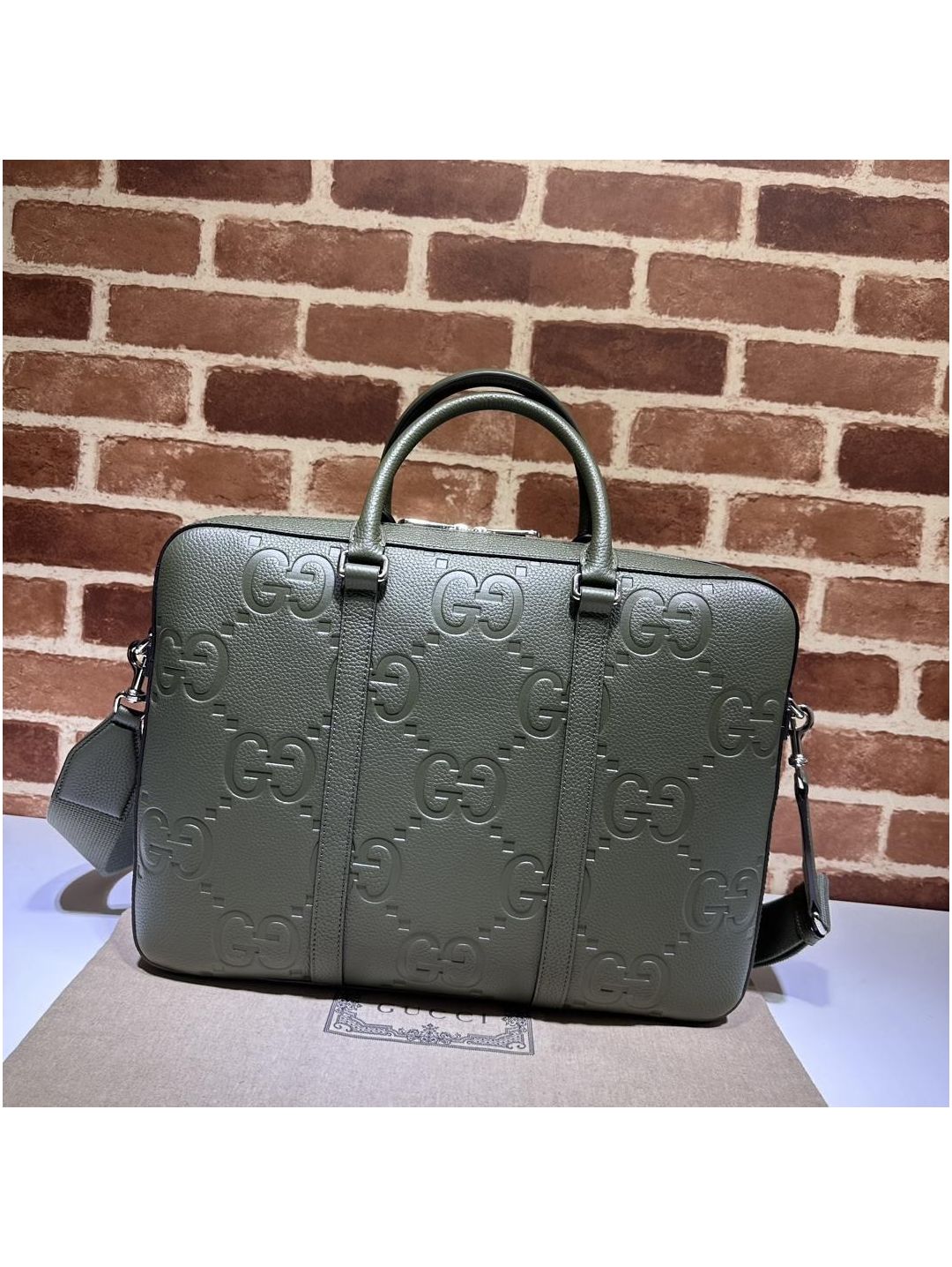 gg-embossed-briefcase-in-sage-green-rxgui292391-01