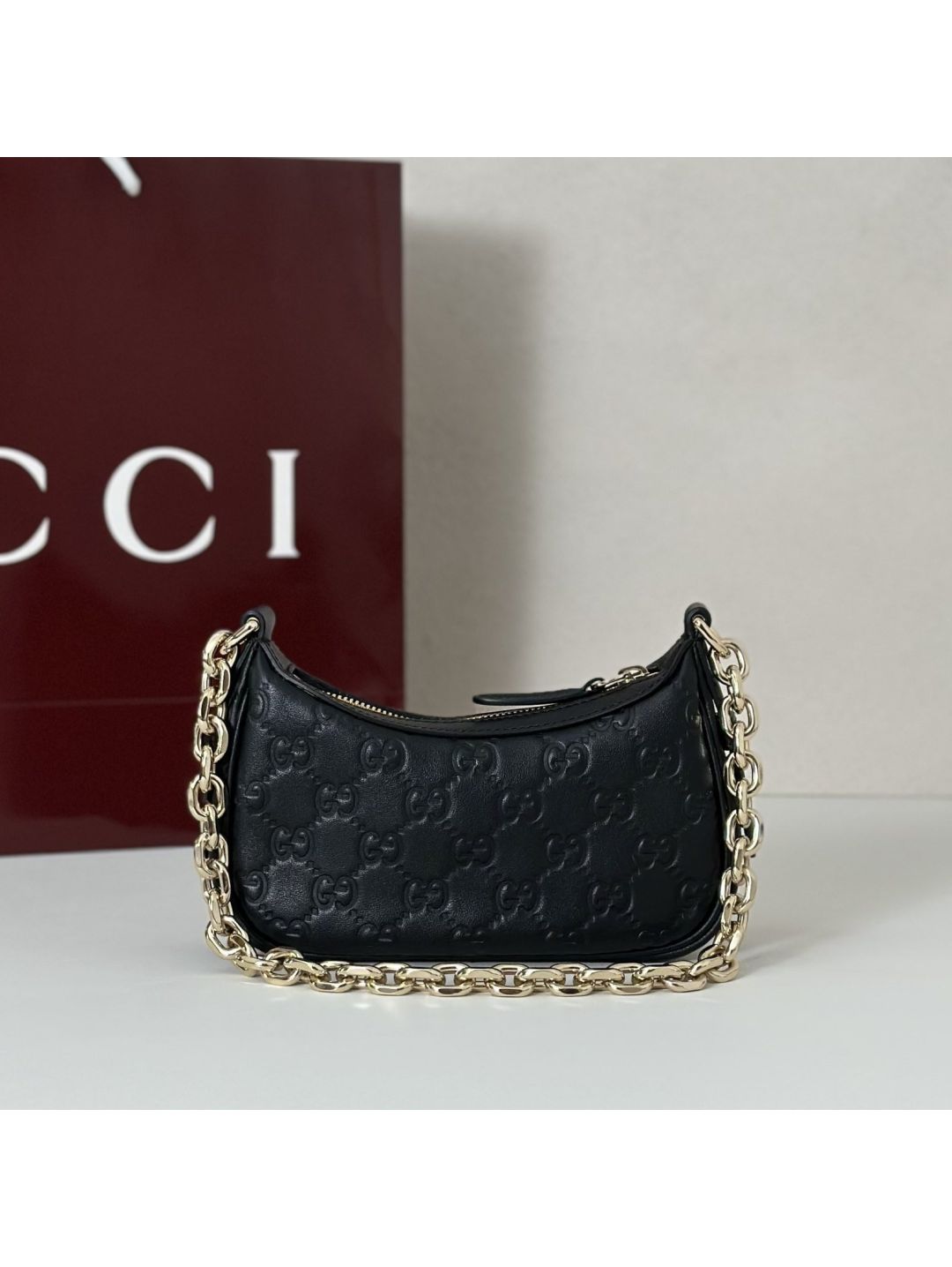 gg-embossed-chain-shoulder-bag-in-black-rxgui292463-03