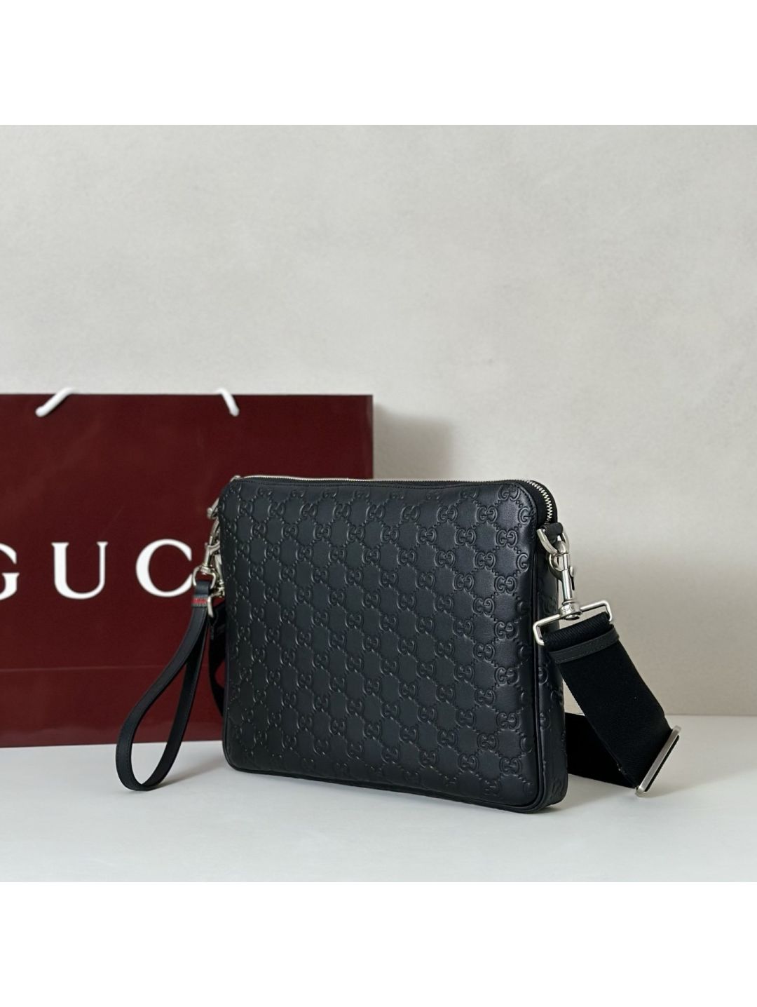 gg-embossed-crossbody-bag-in-black-rxgui292560-02