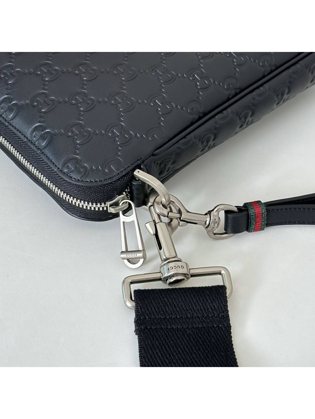 gg-embossed-crossbody-bag-in-black-rxgui292560-05