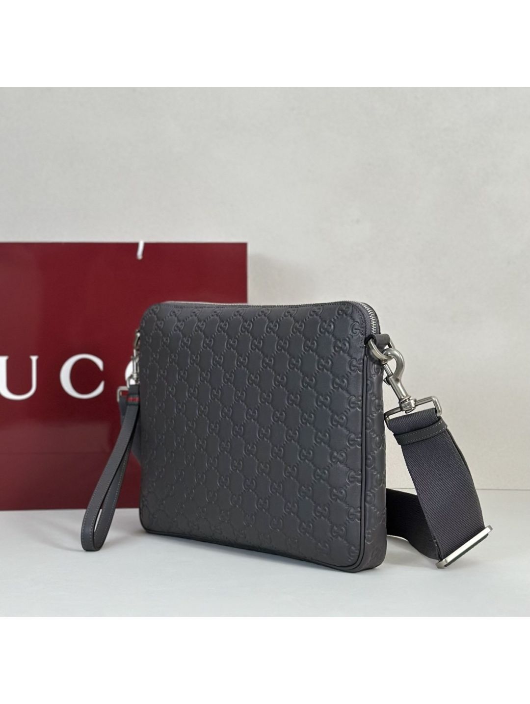 gg-embossed-crossbody-bag-in-grey-rxgui292536-02