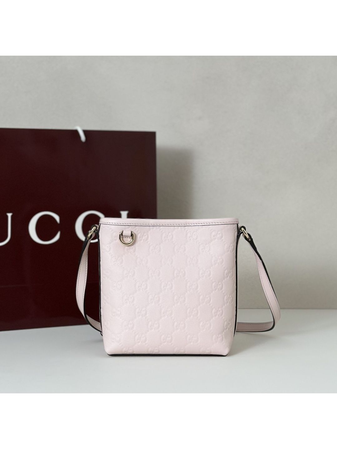 gg-embossed-crossbody-bag-in-nude-rxgui292561-01