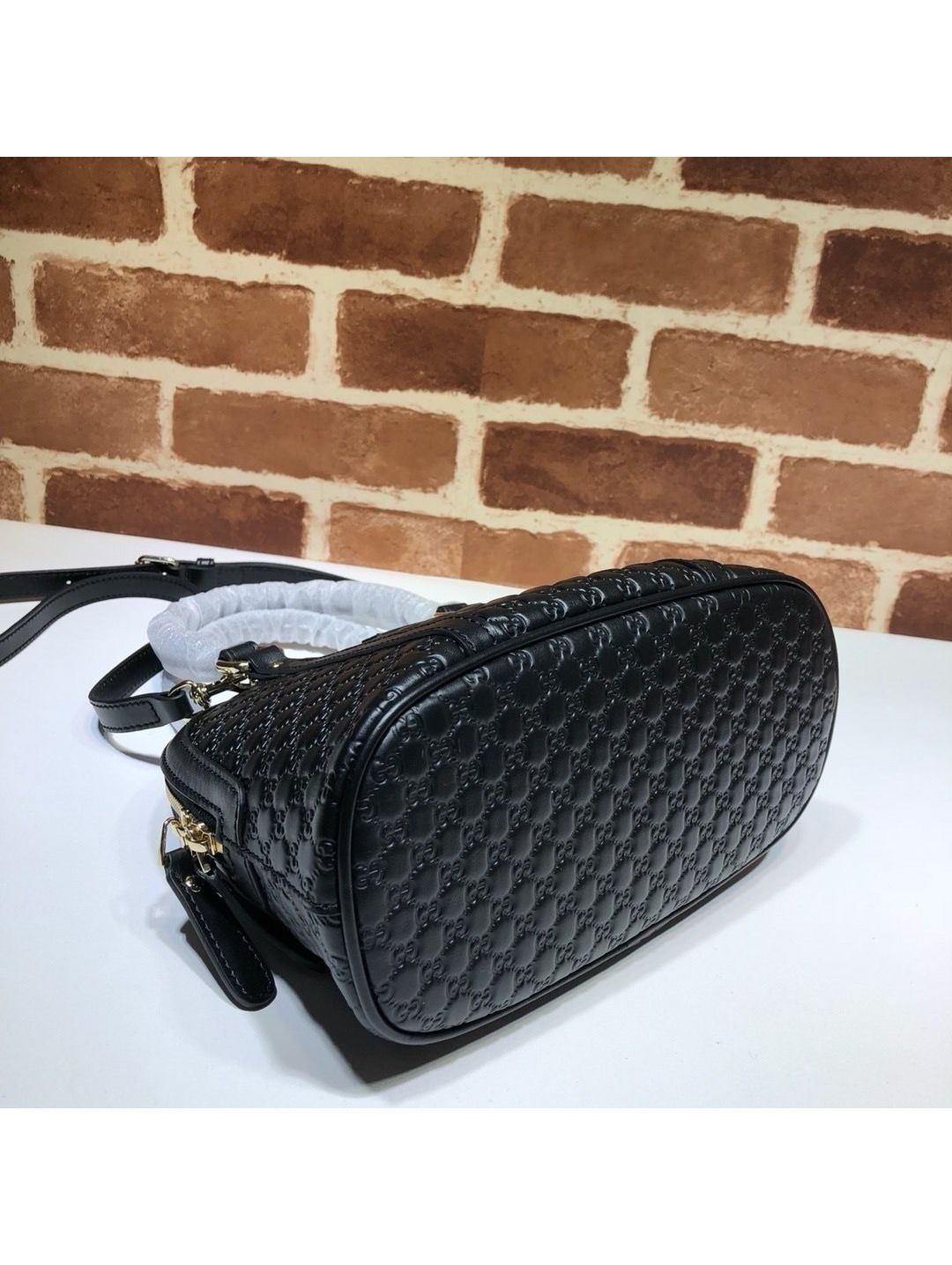 gg-embossed-dome-shoulder-bag-in-black-rxgui292556-04