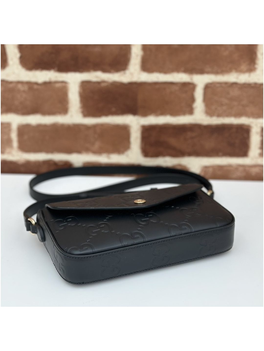 gg-embossed-flap-crossbody-bag-in-black-rxgui292566-04