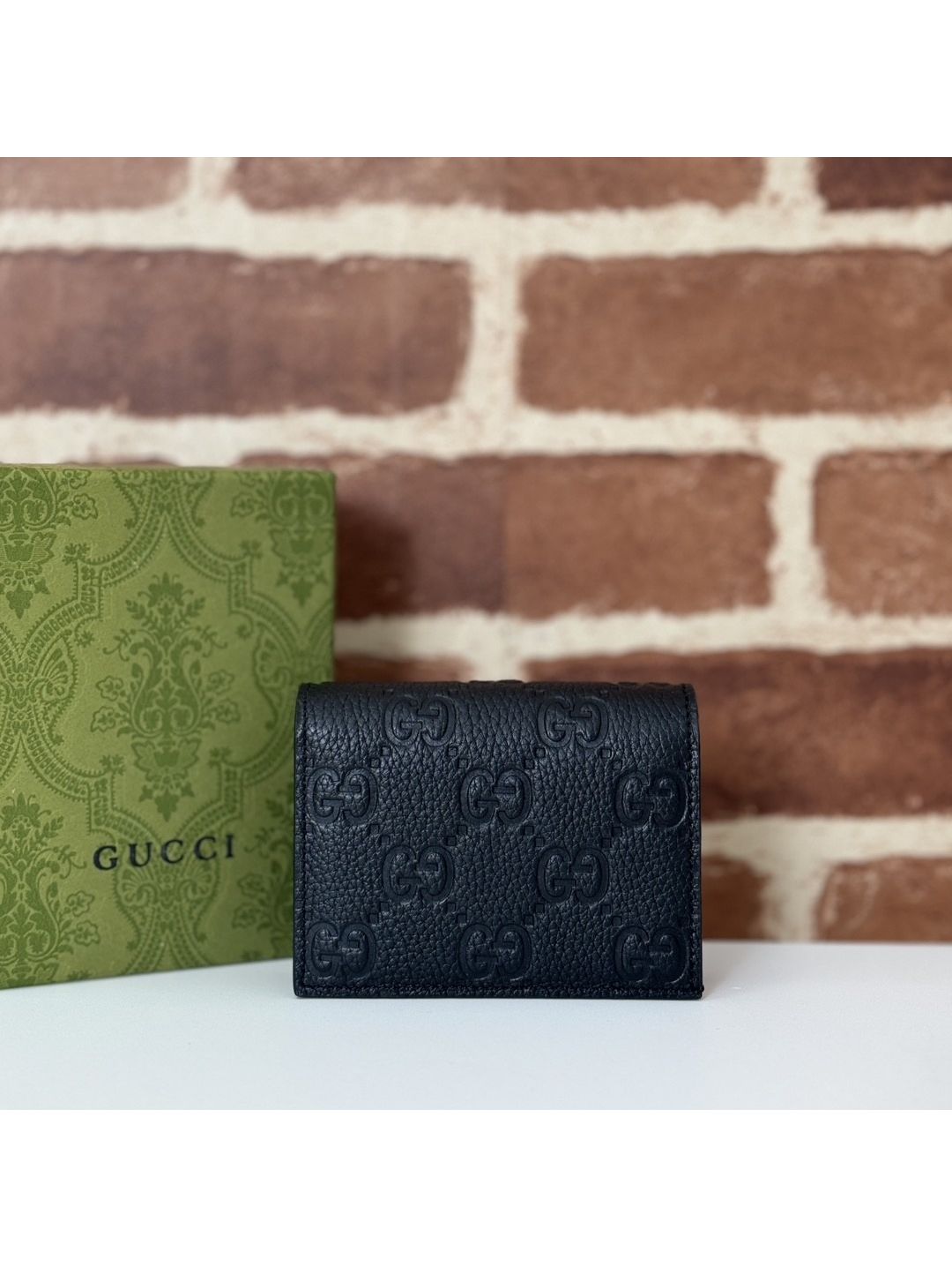 gg-embossed-wallet-in-black-rxgui292541-01
