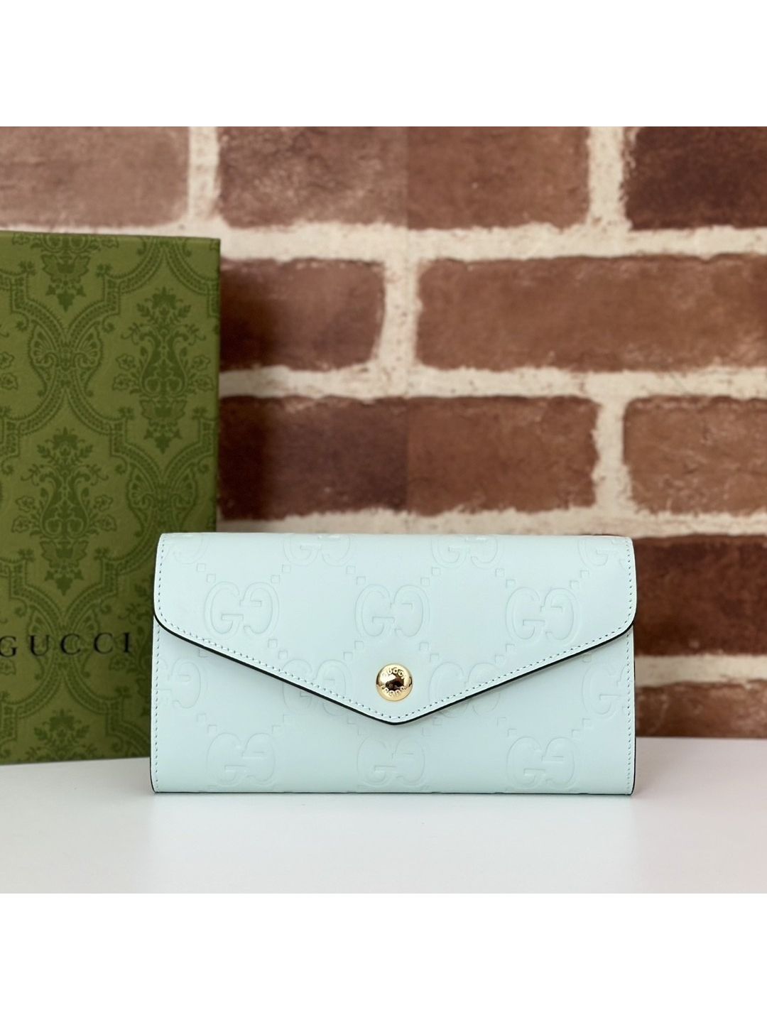 gg-embossed-wallet-in-sage-green-rxgui292562-01