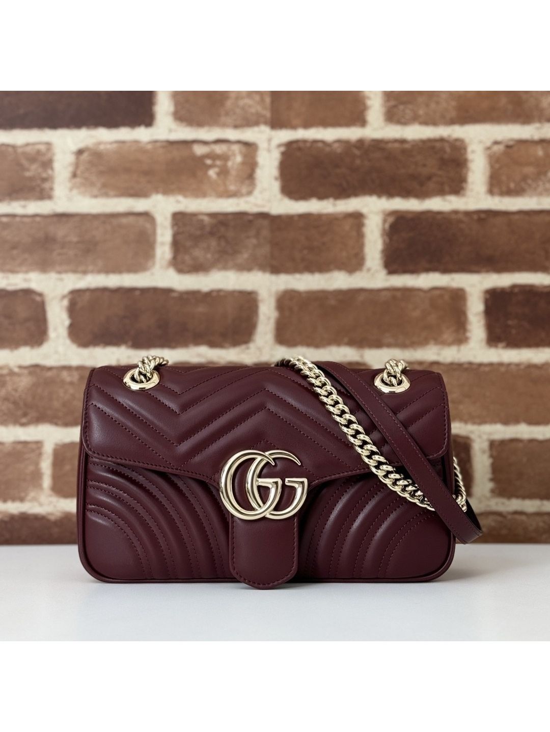 gg-marmont-small-chain-shoulder-bag-443497-in-bright-burgundy-diagonal-matelasse-leather-rxgui271763-01