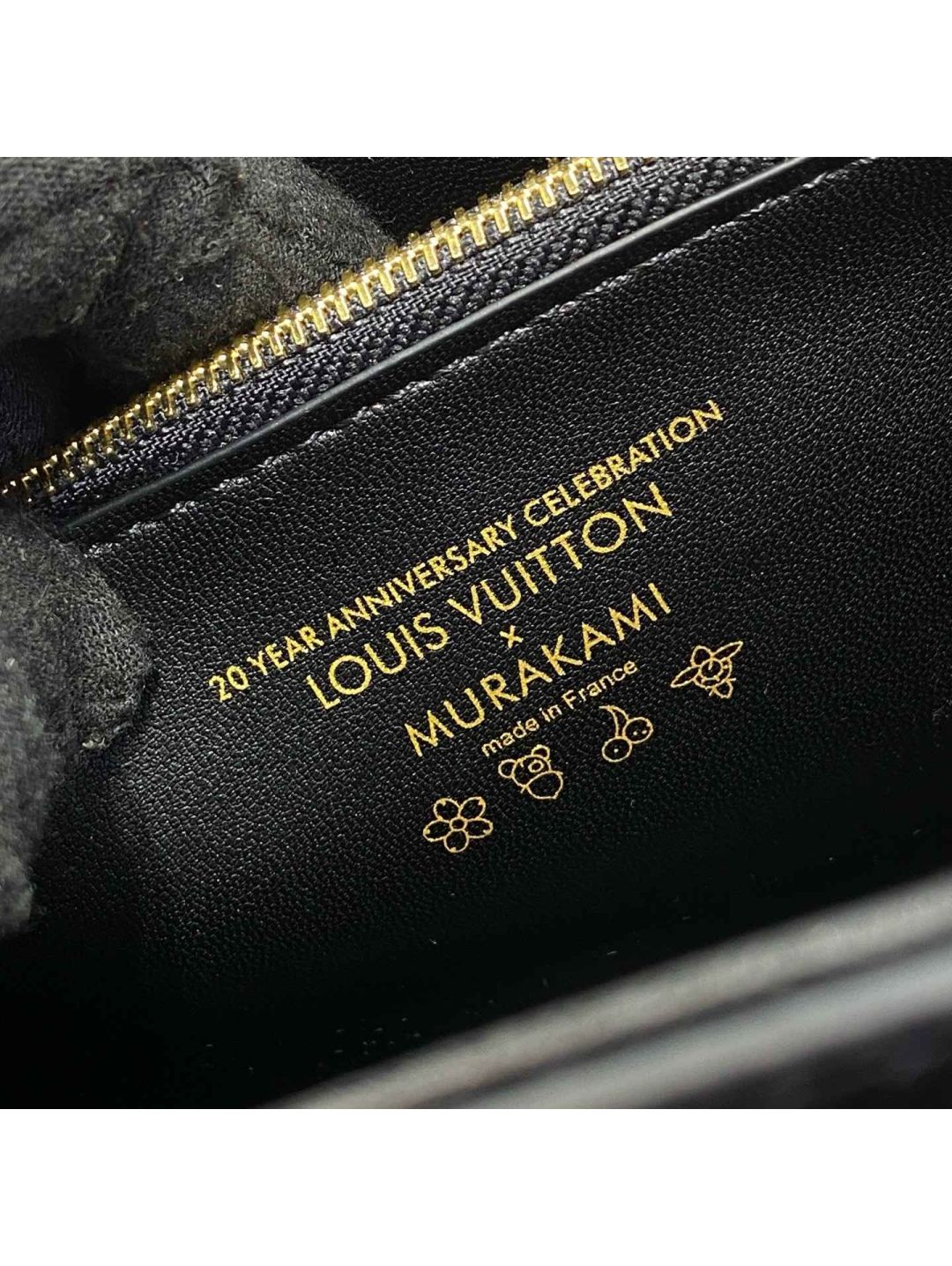 louis-vuitton-black-ribbed-turn-lock-bag-with-colorful-handle-rxlvj01313-02