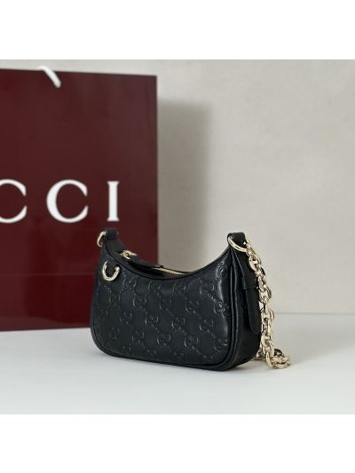 gg-embossed-chain-shoulder-bag-in-black-rxgui292463-02