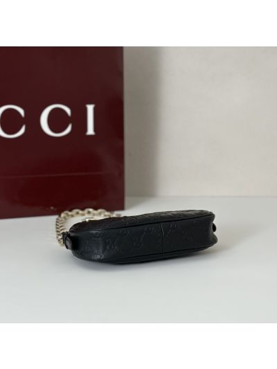 gg-embossed-chain-shoulder-bag-in-black-rxgui292463-04