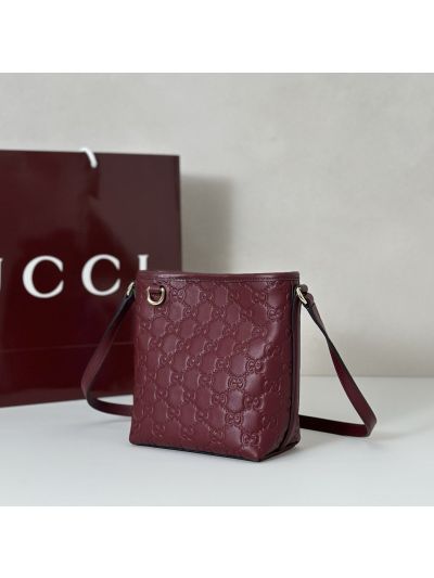 gg-embossed-crossbody-bag-in-burgundy-rxgui292531-02
