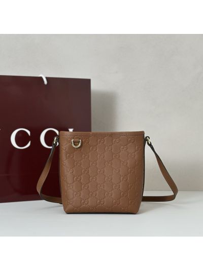 gg-embossed-crossbody-bag-in-tan-rxgui292540-02