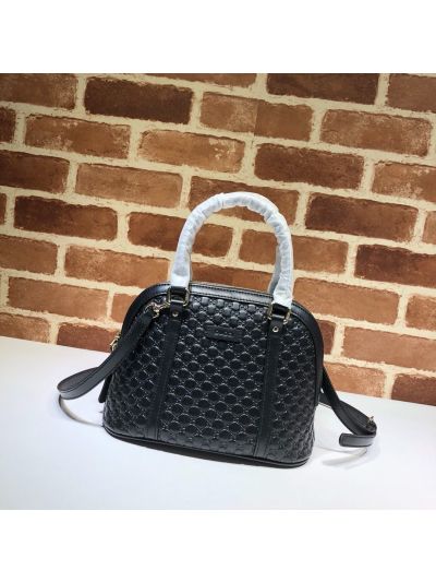 Gucci GG Embossed Dome Shoulder Bag in Black