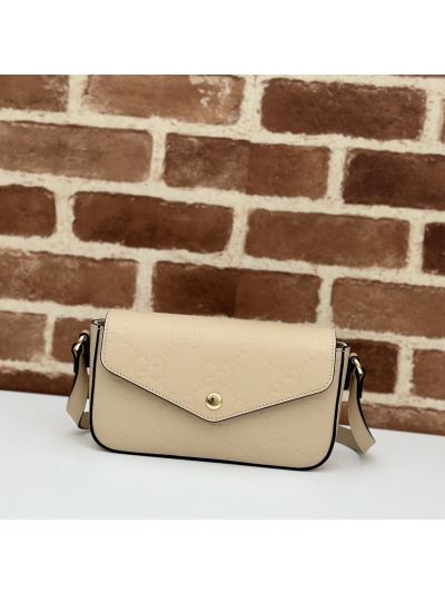 Gucci GG Embossed Flap Crossbody Bag in Beige