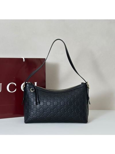 Gucci GG Embossed Shoulder Bag in Black