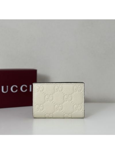 Gucci GG Embossed Wallet in Ivory