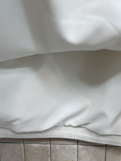 Loewe Embroidered Pleated Mini Skirt in White