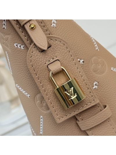 louis-vuitton-beige-stitch-pattern-bucket-bag-rxlvj01188-17