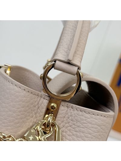 louis-vuitton-beige-top-handle-bag-with-bead-and-chain-details-rxlvj01323-02