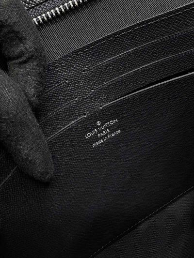 louis-vuitton-black-textured-zip-clutch-rxlvj01152-07