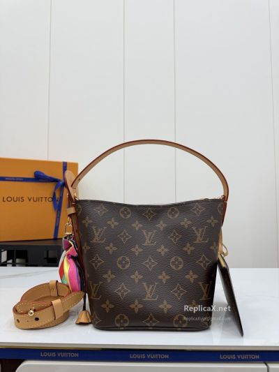 Louis Vuitton Brown Monogram Bucket Bag with Pink Lining