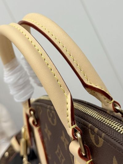 louis-vuitton-brown-monogram-rounded-top-handle-bag-rxlvj01179-02