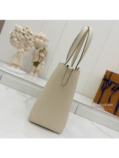 louis-vuitton-cream-embossed-monogram-shoulder-tote-with-padlock-rxlvj01543-02