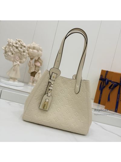 louis-vuitton-cream-embossed-monogram-shoulder-tote-with-padlock-rxlvj01543-04