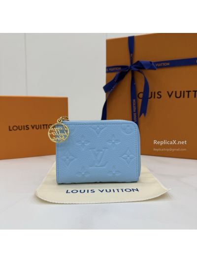 Louis Vuitton Light Blue Embossed Monogram Compact Zip Wallet