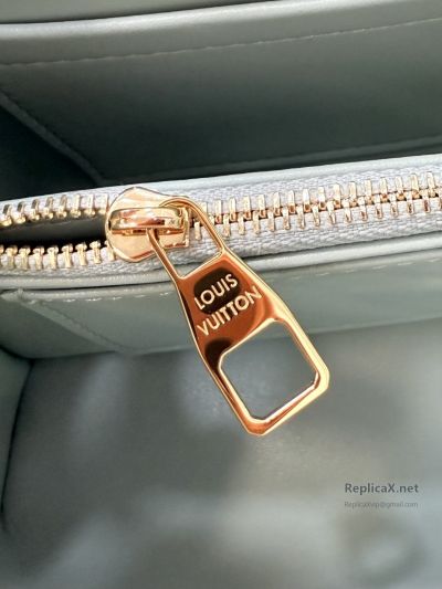 louis-vuitton-mint-braided-handle-tassel-bag-rxlvj02275-03