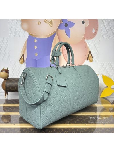 louis-vuitton-pale-blue-embossed-monogram-duffle-bag-rxlvj01598-02