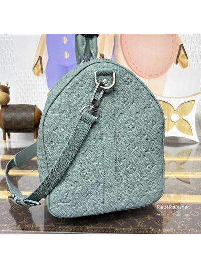 louis-vuitton-pale-blue-embossed-monogram-duffle-bag-rxlvj01598-03