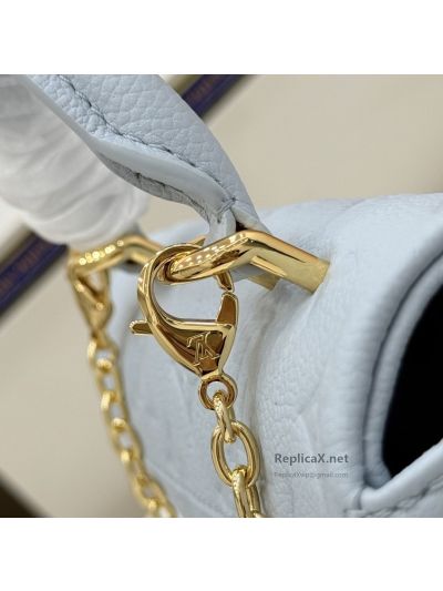 louis-vuitton-pale-blue-embossed-monogram-flap-bag-with-gold-toned-chain-rxlvj01375-02