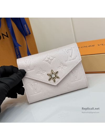 Louis Vuitton Pale Pink Embossed Monogram Compact Envelope Wallet