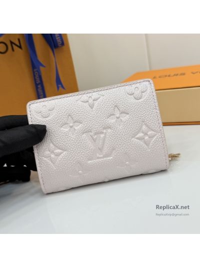 Louis Vuitton Pale Pink Embossed Monogram Folded Zip Wallet