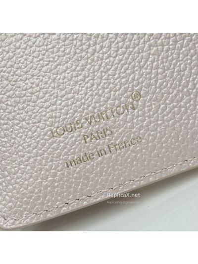 louis-vuitton-pale-pink-embossed-monogram-folded-zip-wallet-rxlvj01585-02