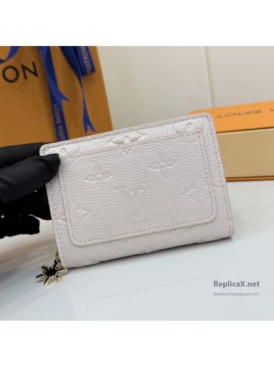 louis-vuitton-pale-pink-embossed-monogram-folded-zip-wallet-rxlvj01585-03