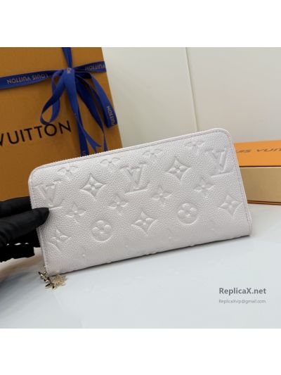 Louis Vuitton Pale Pink Embossed Monogram Long Zip Wallet