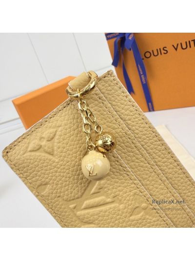 louis-vuitton-pale-yellow-embossed-monogram-card-holder-rxlvj01571-02