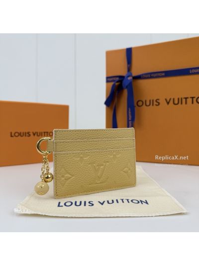 louis-vuitton-pale-yellow-embossed-monogram-card-holder-rxlvj01571-03