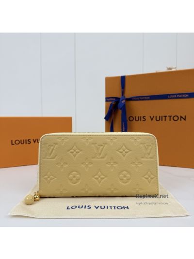 Louis Vuitton Pale Yellow Embossed Monogram Long Zip Wallet