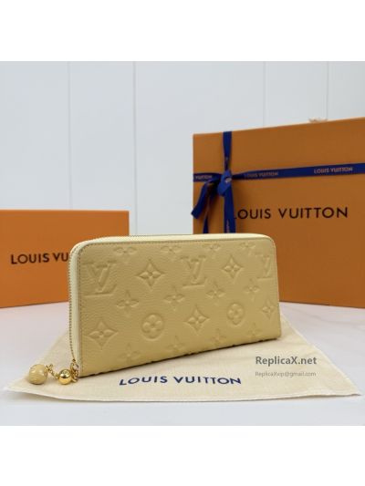louis-vuitton-pale-yellow-embossed-monogram-long-zip-wallet-rxlvj01572-03