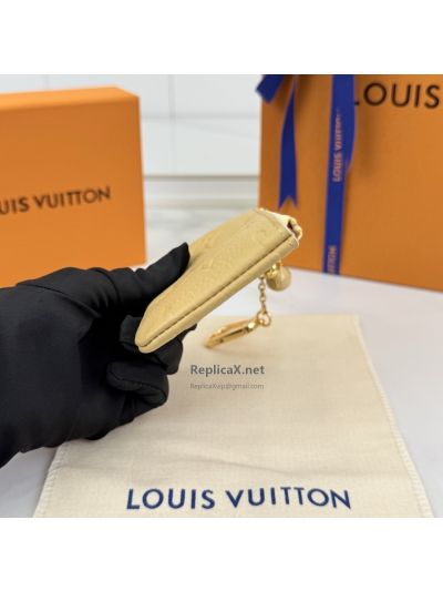 louis-vuitton-pale-yellow-embossed-monogram-zip-key-pouch-rxlvj01570-04