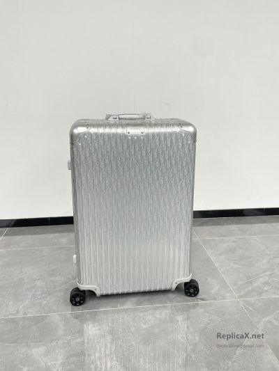 Louis Vuitton Silver-Tone Ribbed Rolling Suitcase
