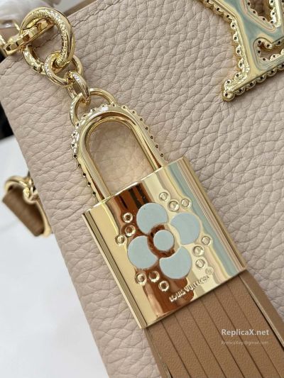 louis-vuitton-taupe-braided-handle-tassel-bag-rxlvj02274-02