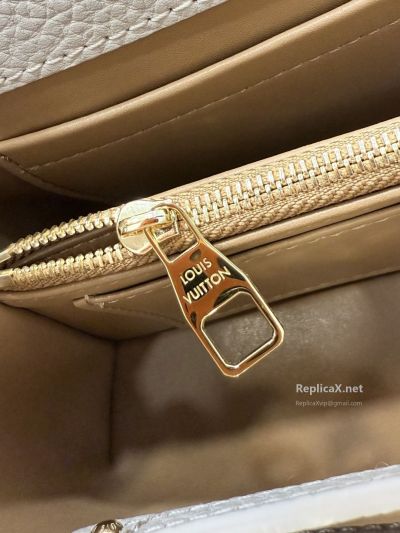 louis-vuitton-taupe-braided-handle-tassel-bag-rxlvj02274-03