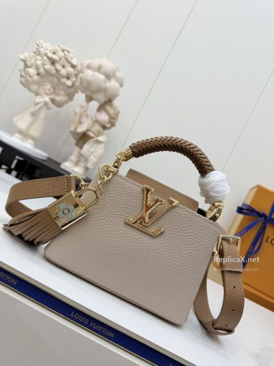 louis-vuitton-taupe-braided-handle-tassel-bag-rxlvj02274-04