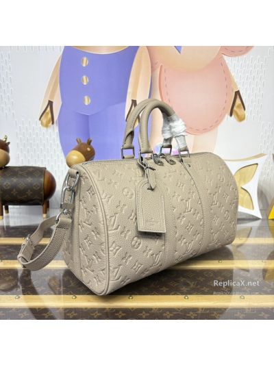 louis-vuitton-taupe-embossed-monogram-duffle-bag-rxlvj01428-02